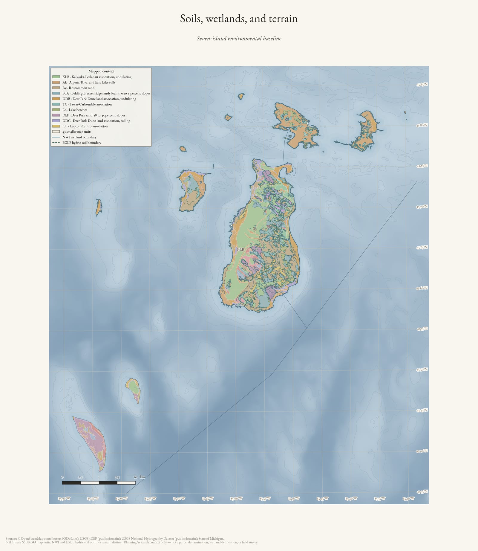 Environmental atlas overview of the Beaver Island archipelago showing colored soil map units, wetland and hydric-soil outlines, streams, and shaded terrain.