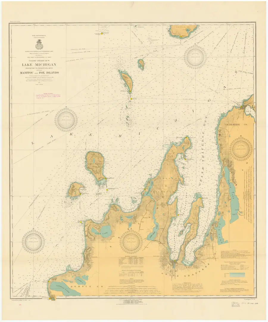 Nautical chart showing coastlines, islands, depth soundings, compass roses, and navigation lines.