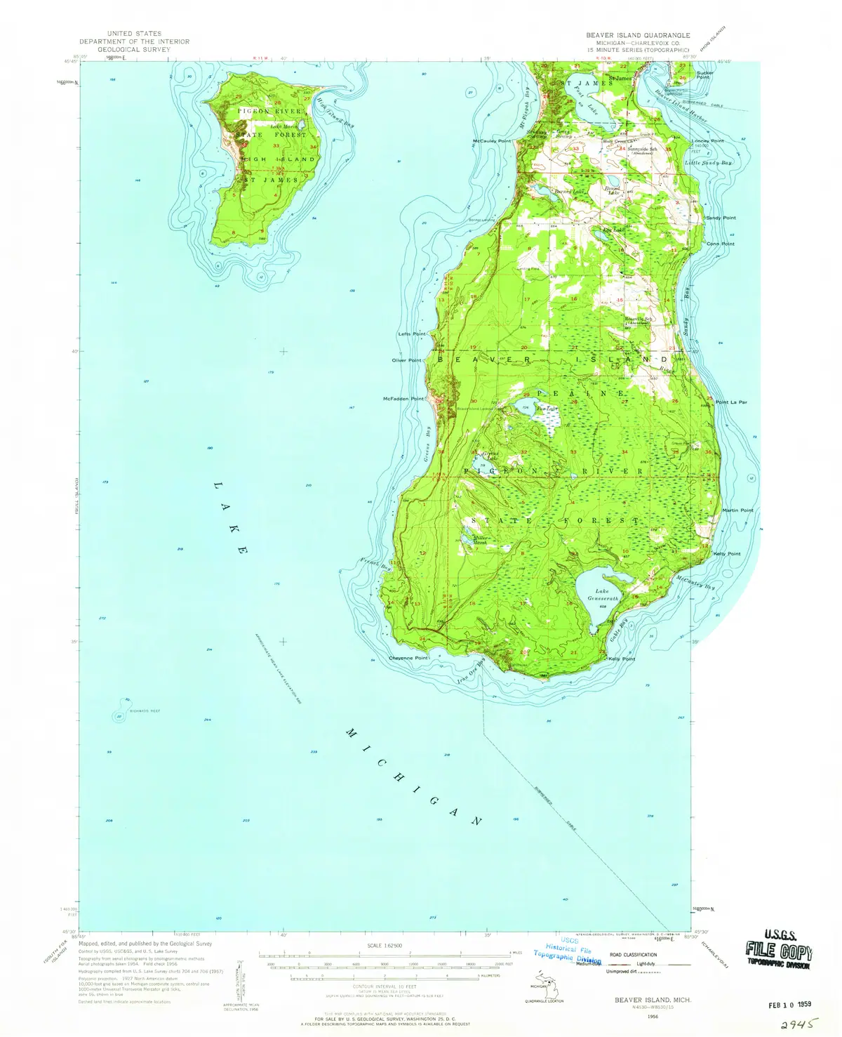 A color topographic map showing a forested landmass, surrounding waters, shore contours, roads, and elevation lines.