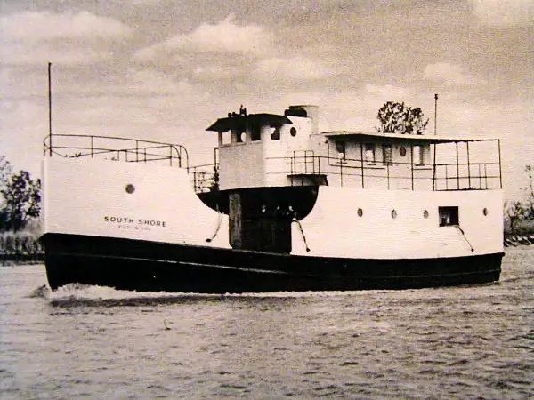 Black-and-white photograph of the ferry South Shore moving through the water.