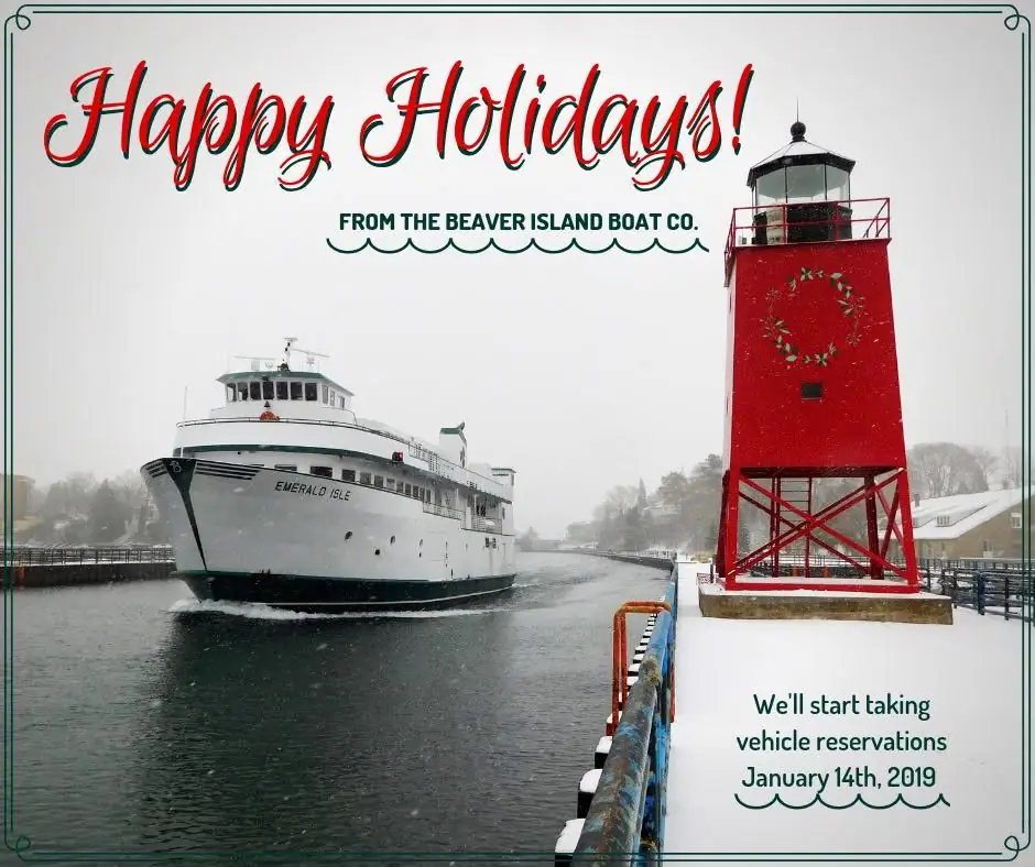 White ferry passing a red lighthouse in a snowy harbor scene with holiday and reservation lettering.