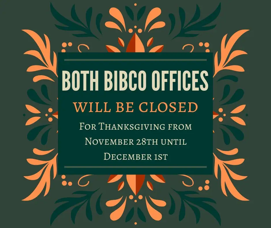 Decorative office-closure announcement surrounded by orange and dark green botanical ornament.