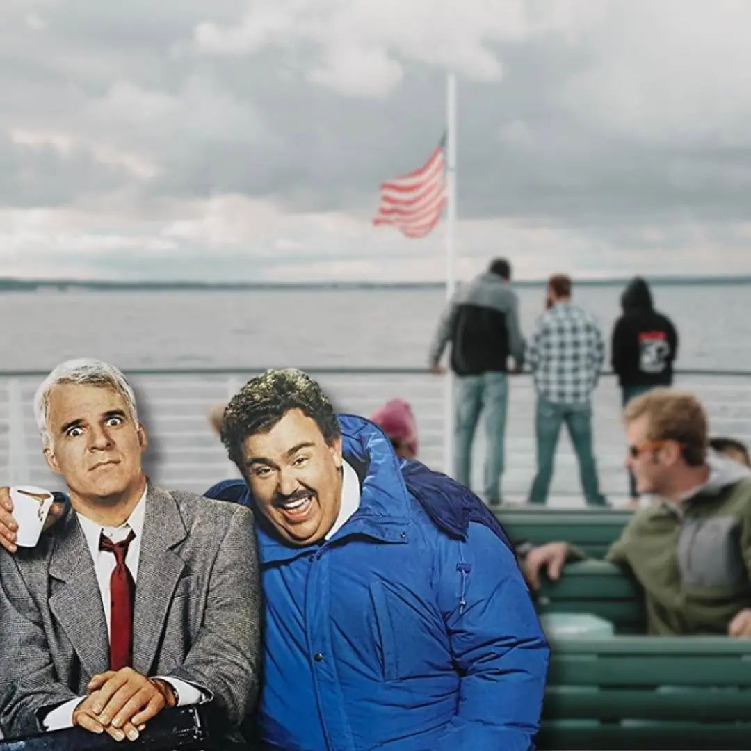 Composite image of two men seated on a ferry deck with passengers, benches, water, and an American flag behind them.