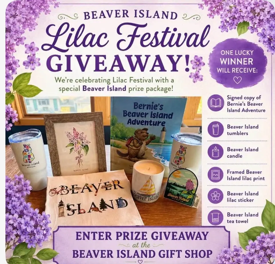 Promotional giveaway graphic featuring lilacs and a prize display of themed merchandise.