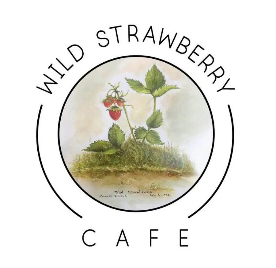 Circular botanical illustration of a wild strawberry plant with red berries, surrounded by the words “WILD STRAWBERRY” and “CAFE.”