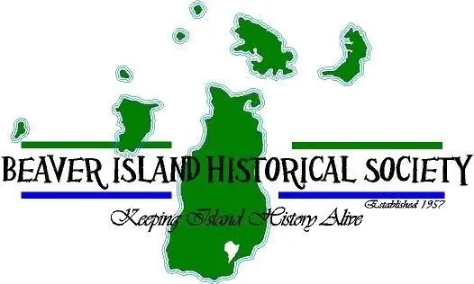 A green-and-white historical society logo showing map-like silhouettes and the words “Keeping Island History Alive.”